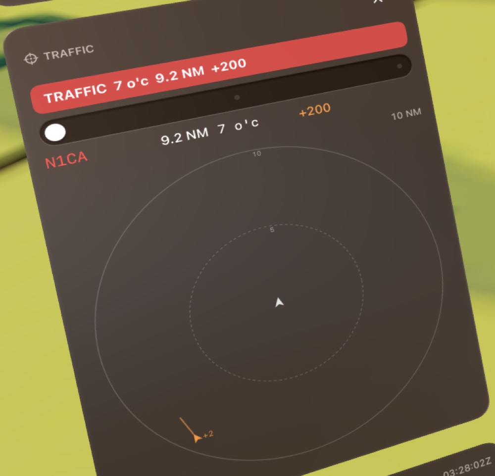 The traffic panel with a red advisory banner reading TRAFFIC 7 o'clock 9.2 NM +200, the contact N1CA highlighted red above a 10 NM scope with the contact and its vector at 7 o'clock.